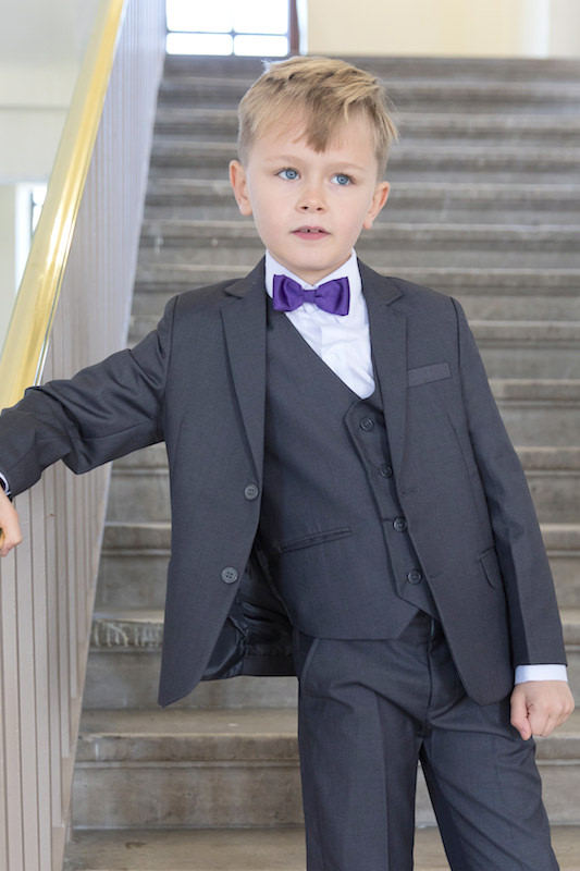 gray suit purple bow tie