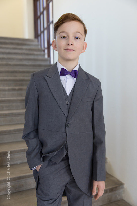 gray suit purple bow tie